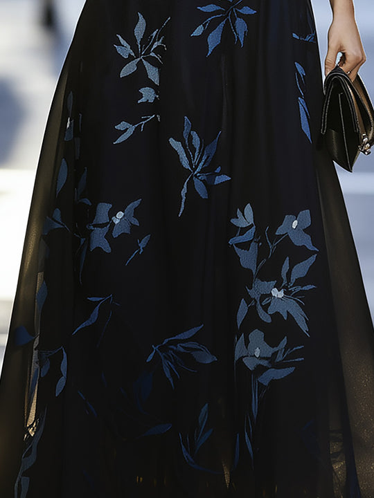 Elegant Black Chiffon Maxi Dress With Sheer Neckline And Floral Print
