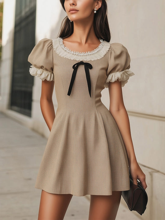 Stylish Beige Mini Dress With Puffy Sleeves And Classic Bow Detail