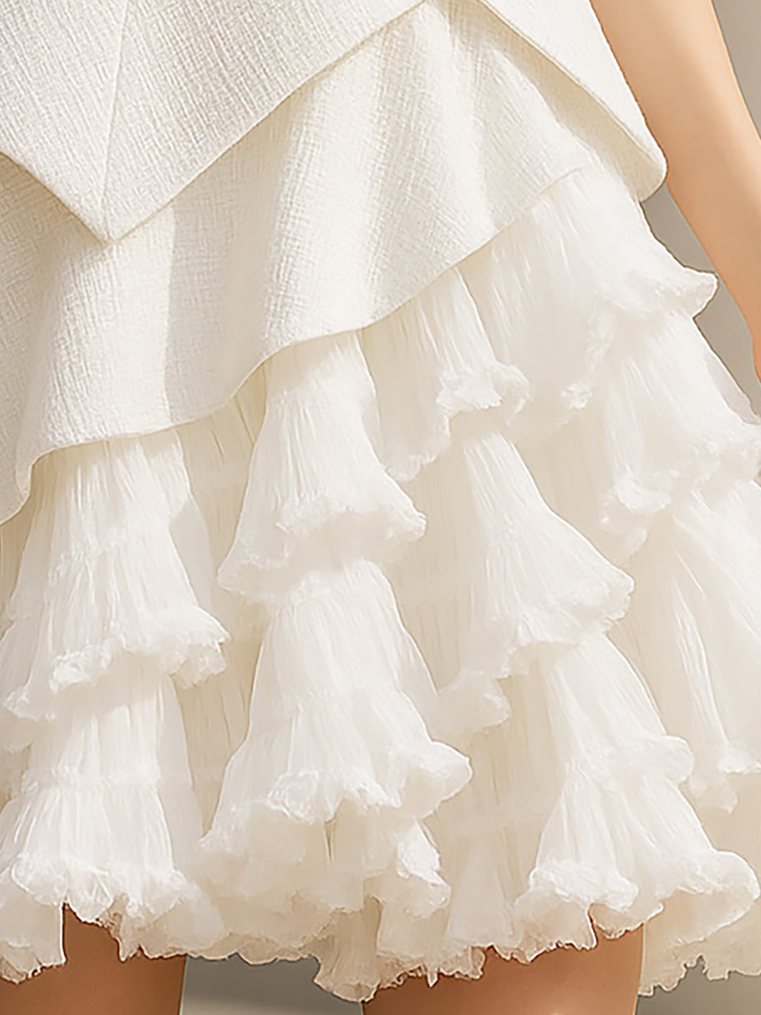 Elegant White Tiered Mini Dress With Bow Detail