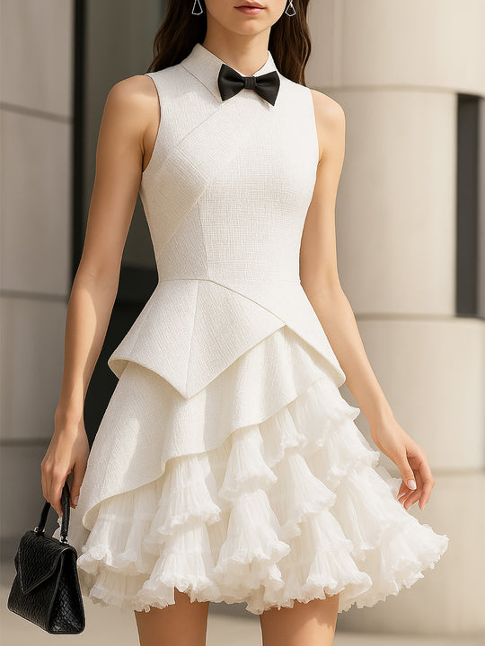 Elegant White Tiered Mini Dress With Bow Detail